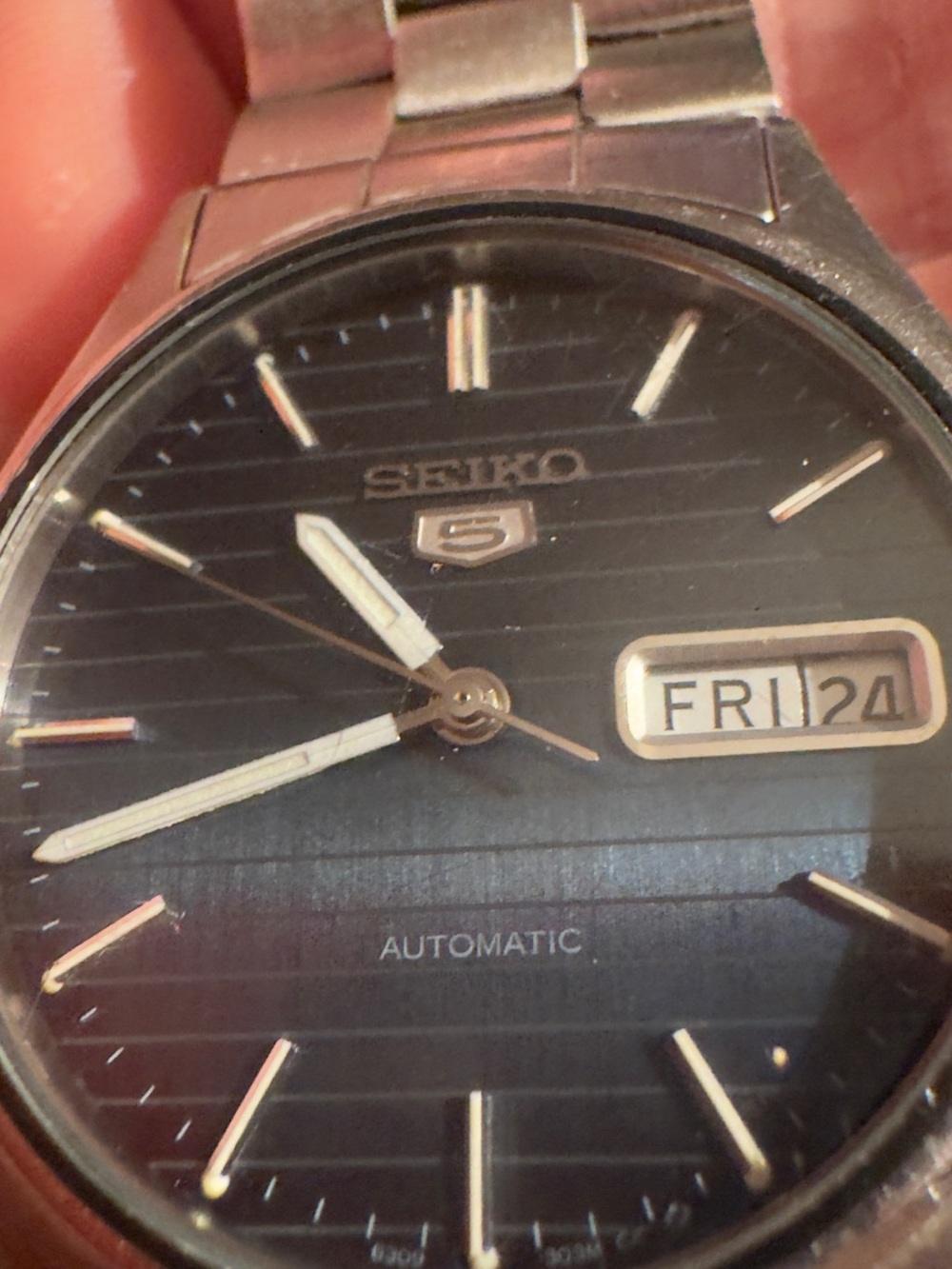 Seiko Black Dial Automatic Watch with Silver Accents vintage seiko5